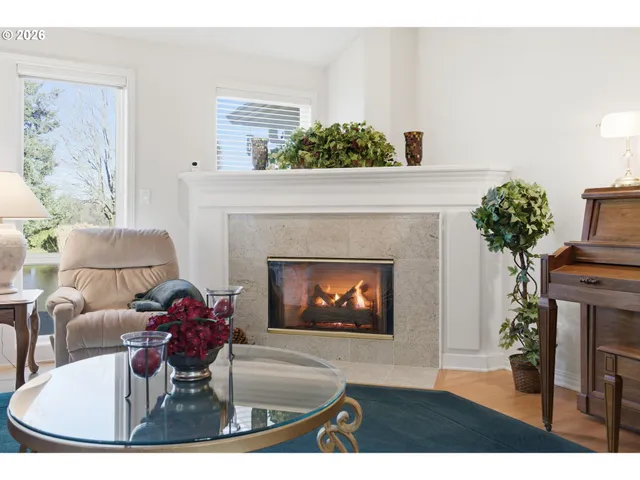 a view of kitchen with furniture and wooden floor