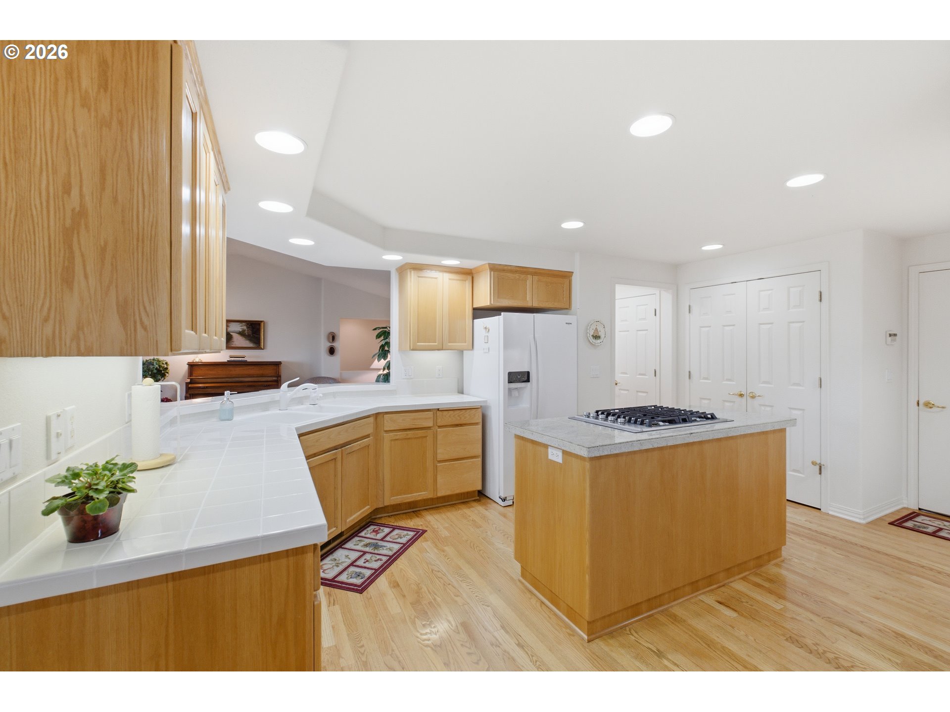 6428 Castle Lakes Court Keizer, OR 97303 - Photo 14 of 48 a kitchen with stainless steel appliances granite countertop a stove a sink a refrigerator and a refrigerator