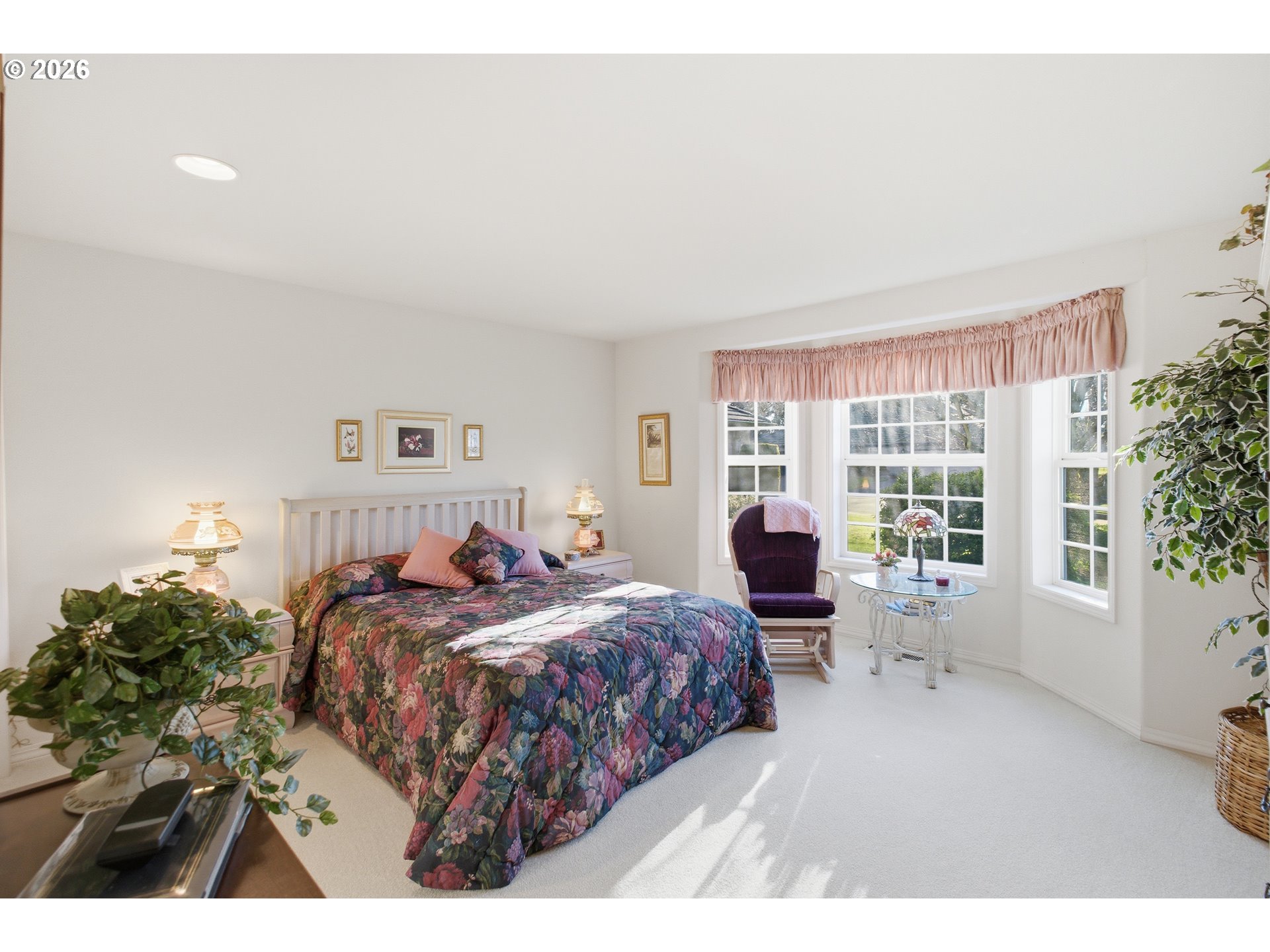 6428 Castle Lakes Court Keizer, OR 97303 - Photo 26 of 48 a bedroom with a large bed and a window