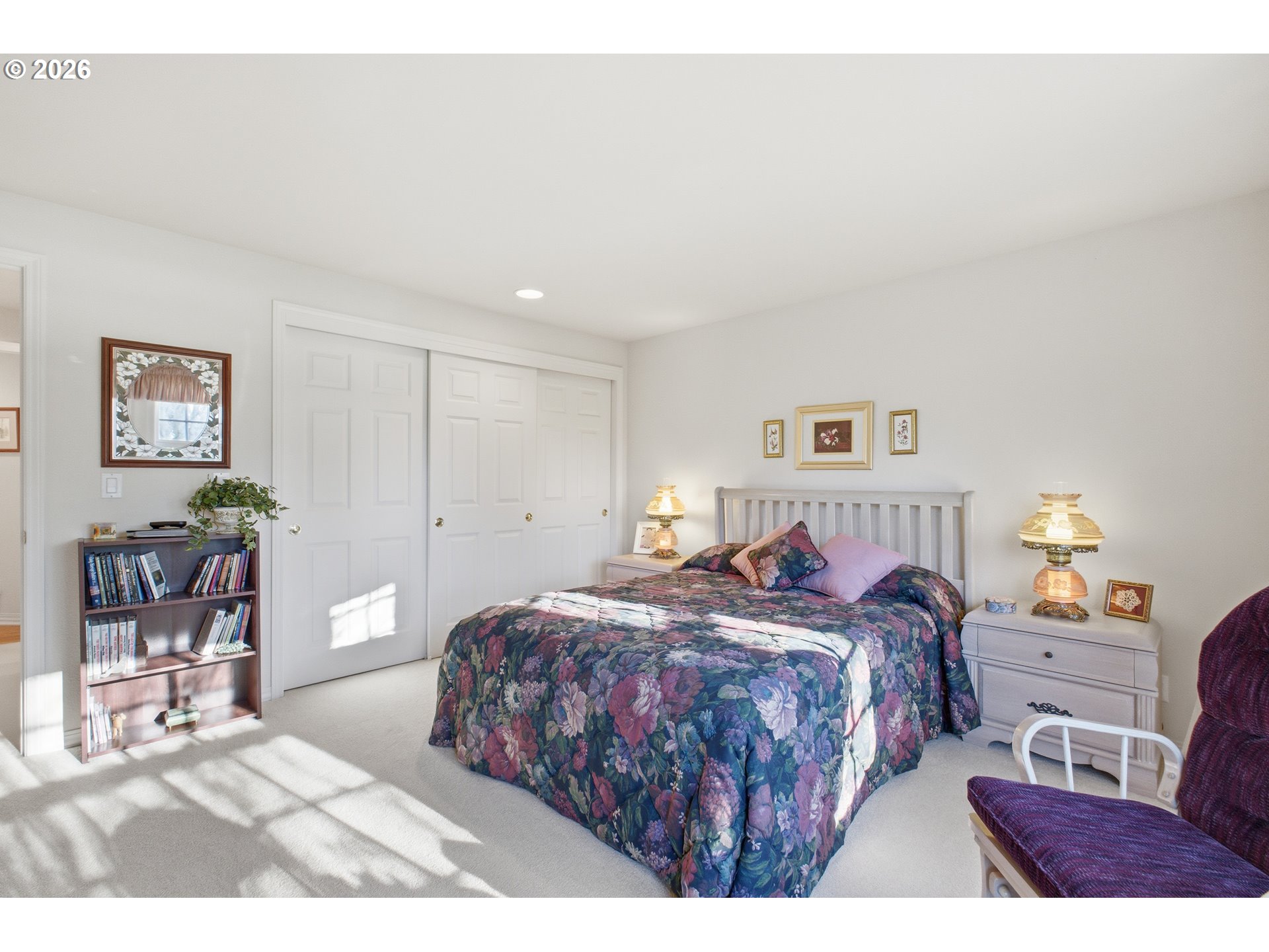6428 Castle Lakes Court Keizer, OR 97303 - Photo 27 of 48 a bedroom with a bed a table and chair