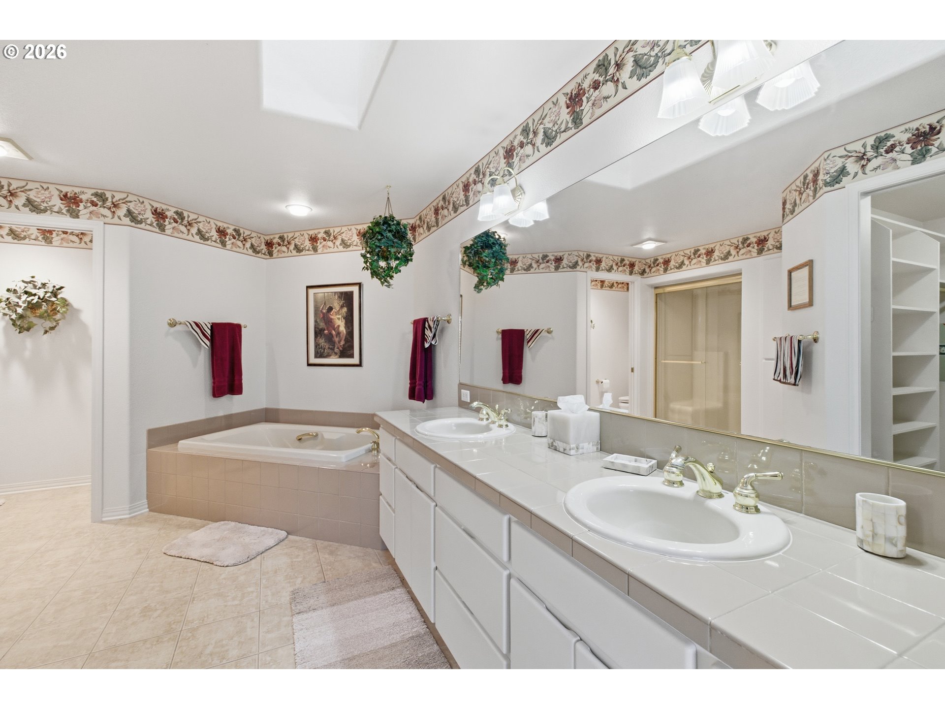 6428 Castle Lakes Court Keizer, OR 97303 - Photo 32 of 48 a bathroom with a granite countertop double vanity sink mirror bathtub and shower