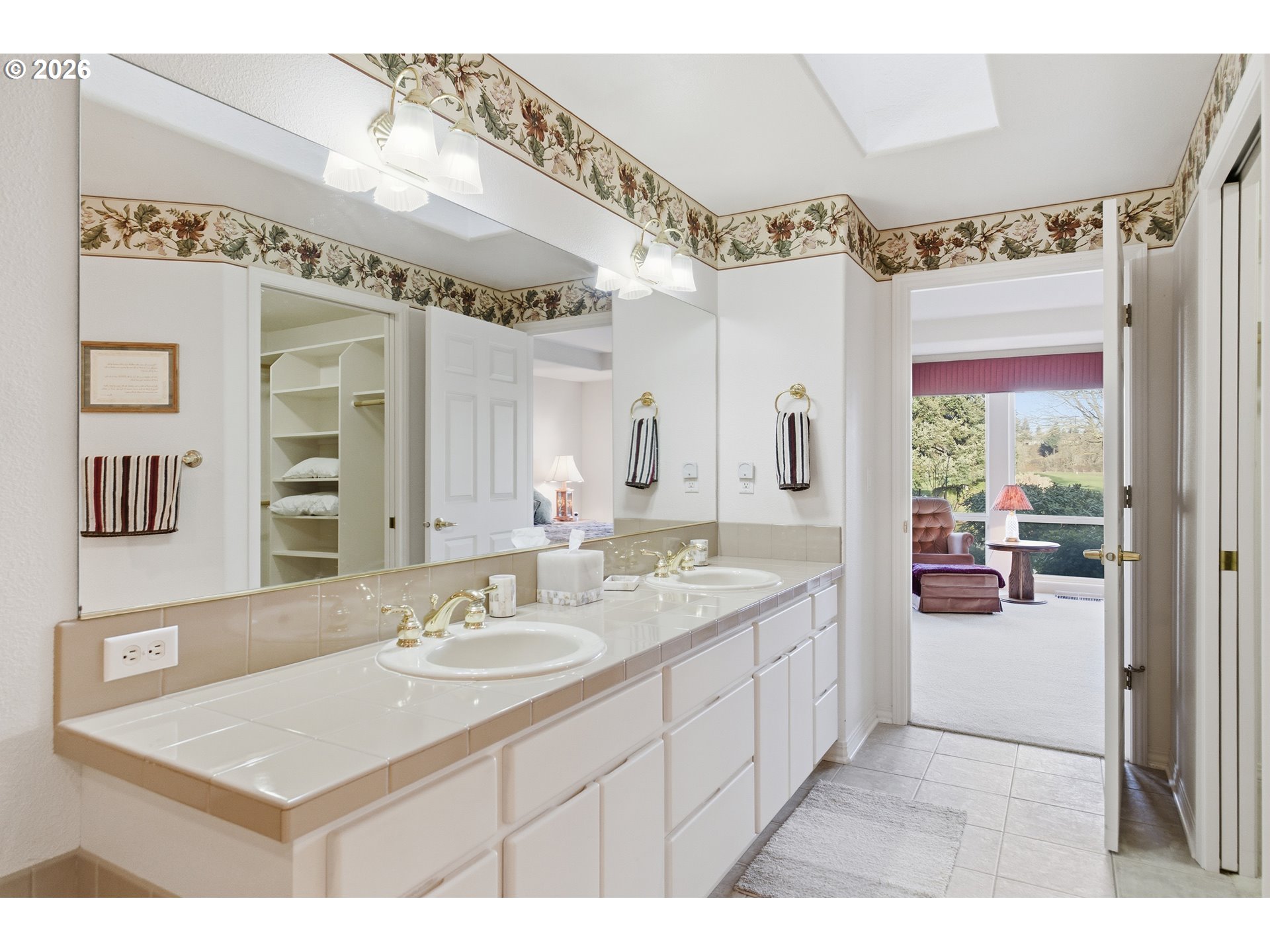 6428 Castle Lakes Court Keizer, OR 97303 - Photo 34 of 48 a bathroom with a sink a mirror and a shower