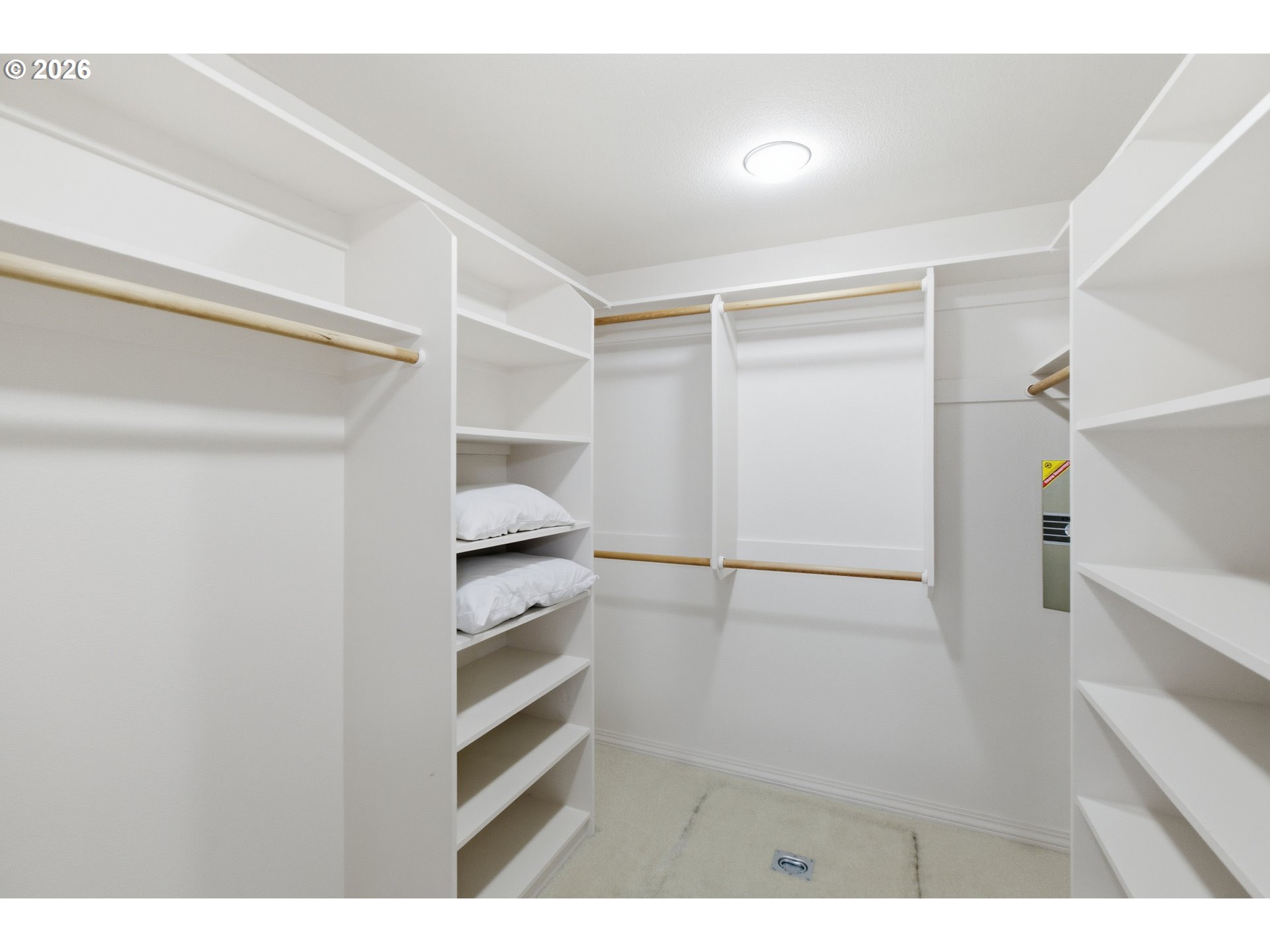 6428 Castle Lakes Court Keizer, OR 97303 - Photo 35 of 48 a view of walk in closet with empty racks