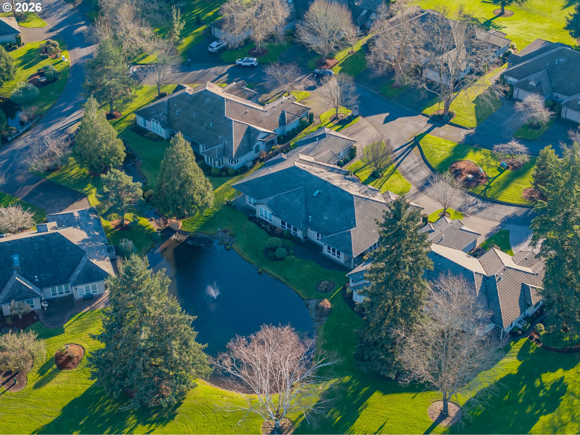 6428 Castle Lakes Court Keizer, OR 97303 - Photo 40 of 48 an aerial view of a house with a yard and outdoor seating