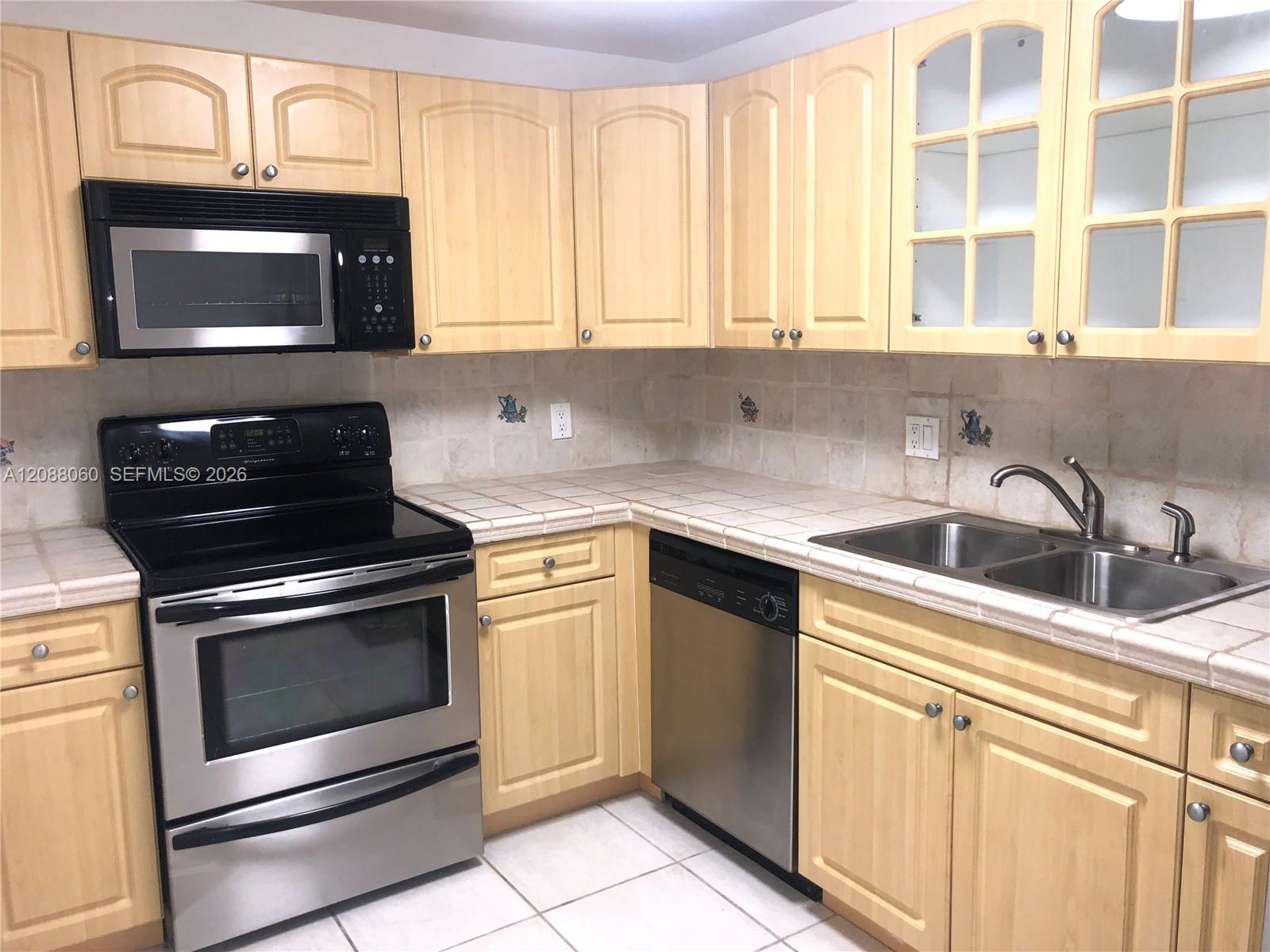 150 Southeast 25th Road, Unit 7E Miami, FL 33129 - Photo 13 of 42 Clean and bright kitchen