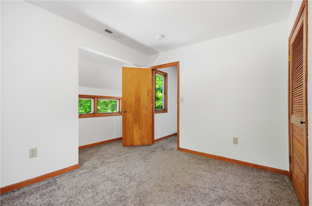 1298 Carradine Road Seneca, SC 29678 - Photo 27 of 43 A well-lit bedroom provides a comfortable and inviting retreat.