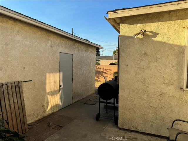 a bathroom with a shower and a sink