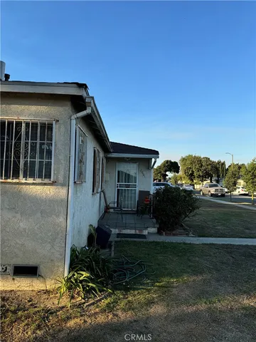 a house view with a garden space