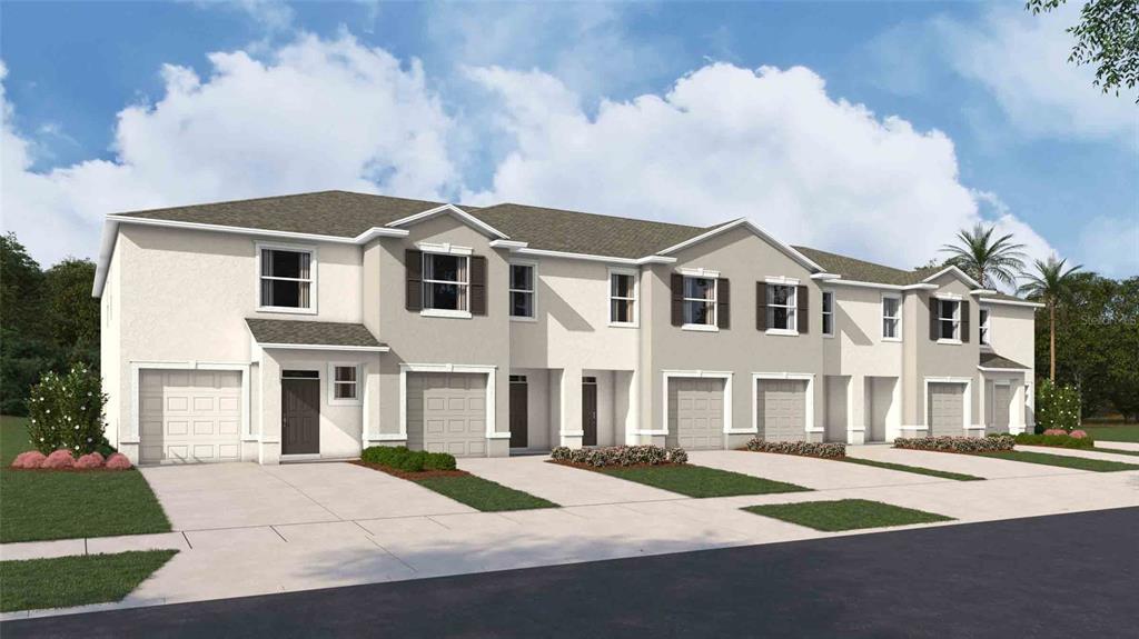 31107 Paper Birch Street Wesley Chapel, FL 33545 - Photo 2 of 15 a front view of residential houses with yard
