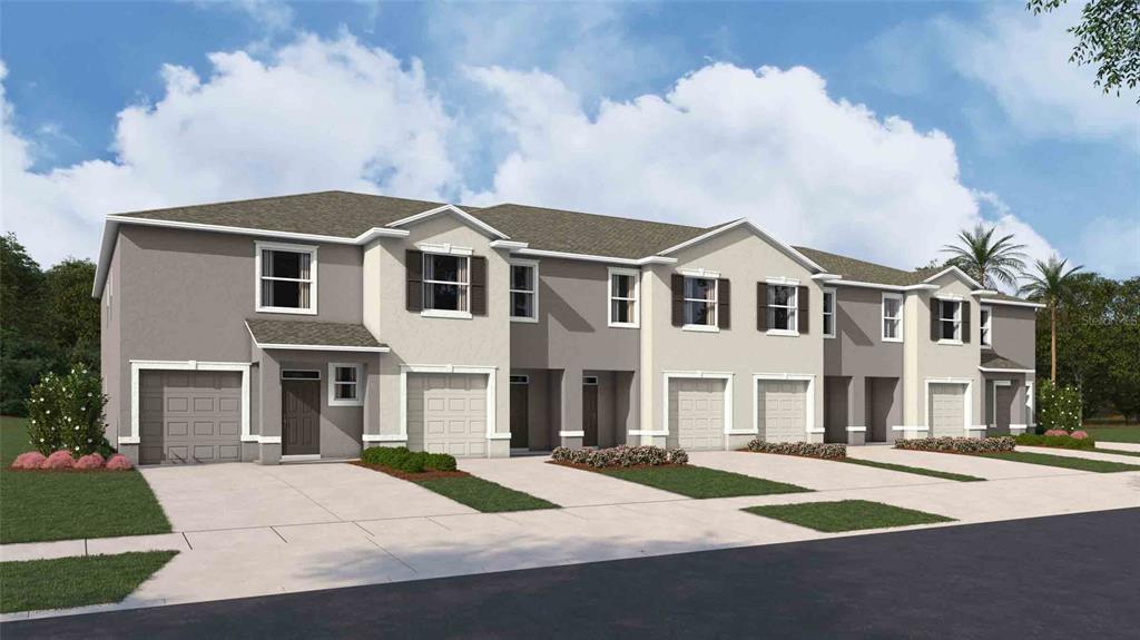 31107 Paper Birch Street Wesley Chapel, FL 33545 - Photo 3 of 15 a front view of residential houses with yard