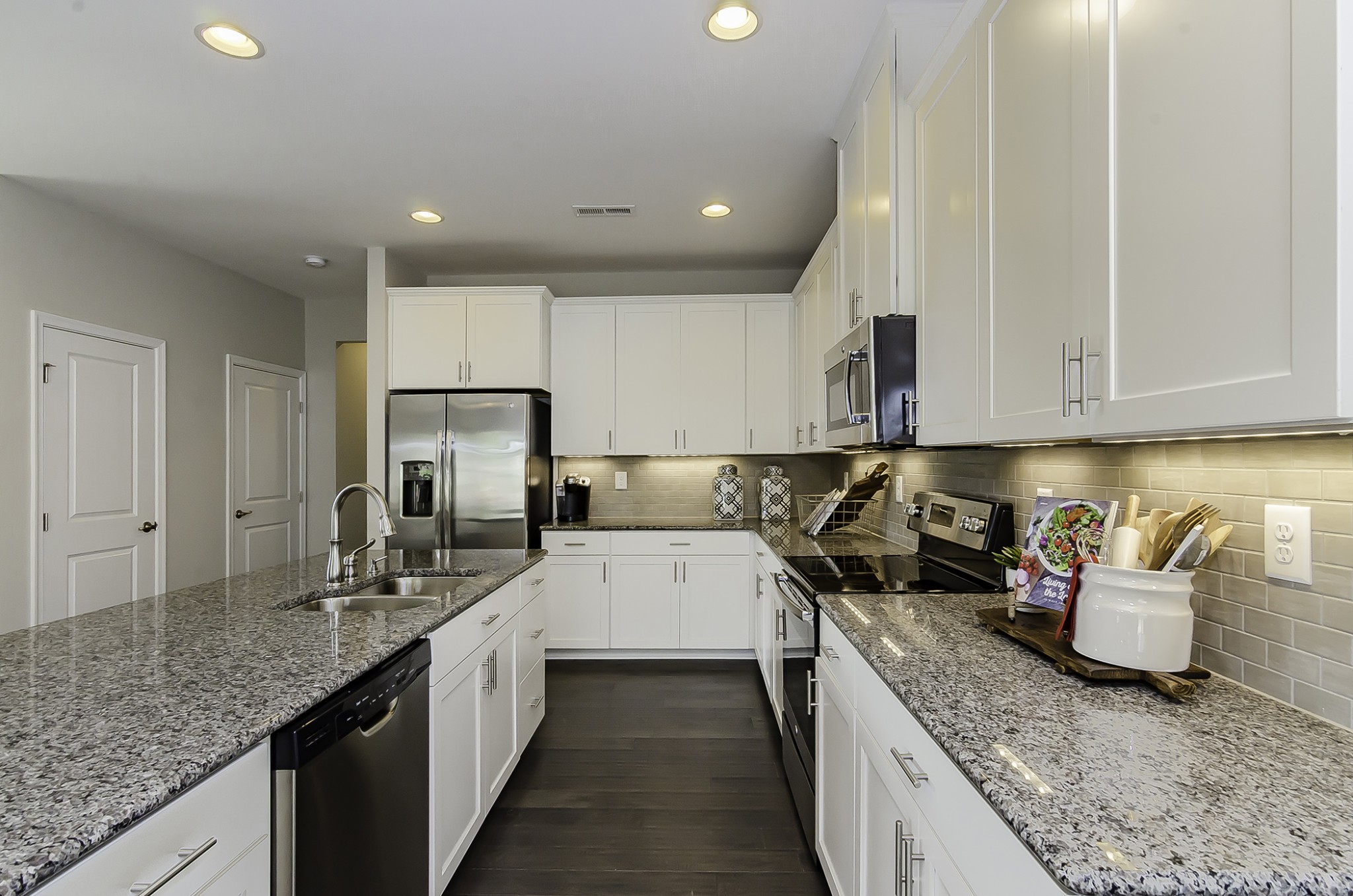 118 Keelon Gap Road Spring Hill, TN 37174 - Photo 4 of 11 a kitchen with granite countertop stainless steel appliances lots of counter top space