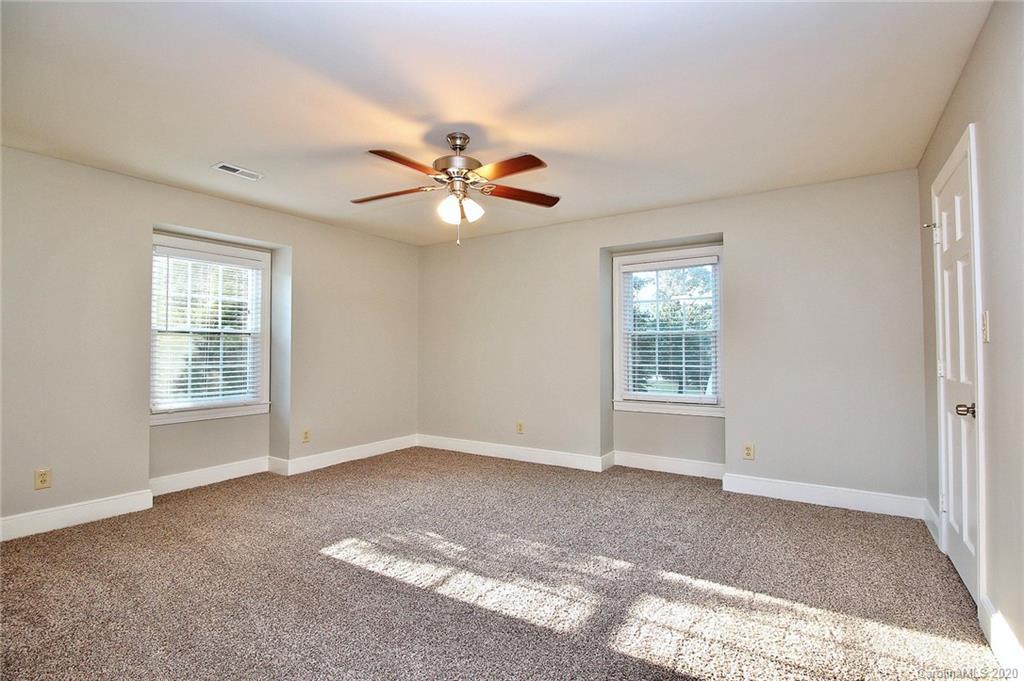 4312 Carmel Road Charlotte, NC 28226 - Photo 17 of 36 a view of an empty room with a window
