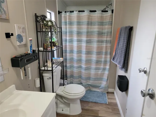 a view of swimming pool with seating area