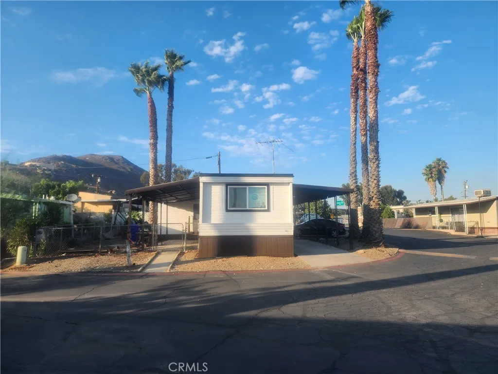 3319 Avalon Street, Unit 78 Riverside, CA 92509 - Photo 2 of 37 a front view of a house with street