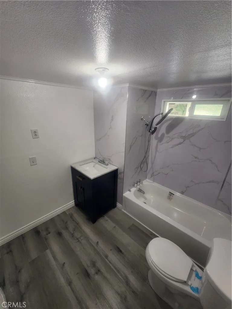 3319 Avalon Street, Unit 78 Riverside, CA 92509 - Photo 30 of 37 a bathroom with a sink toilet and shower