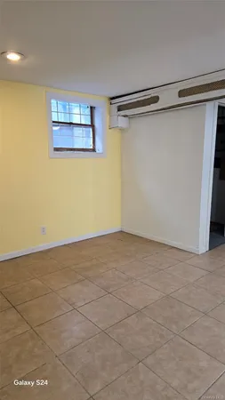 a view of a room with an empty space