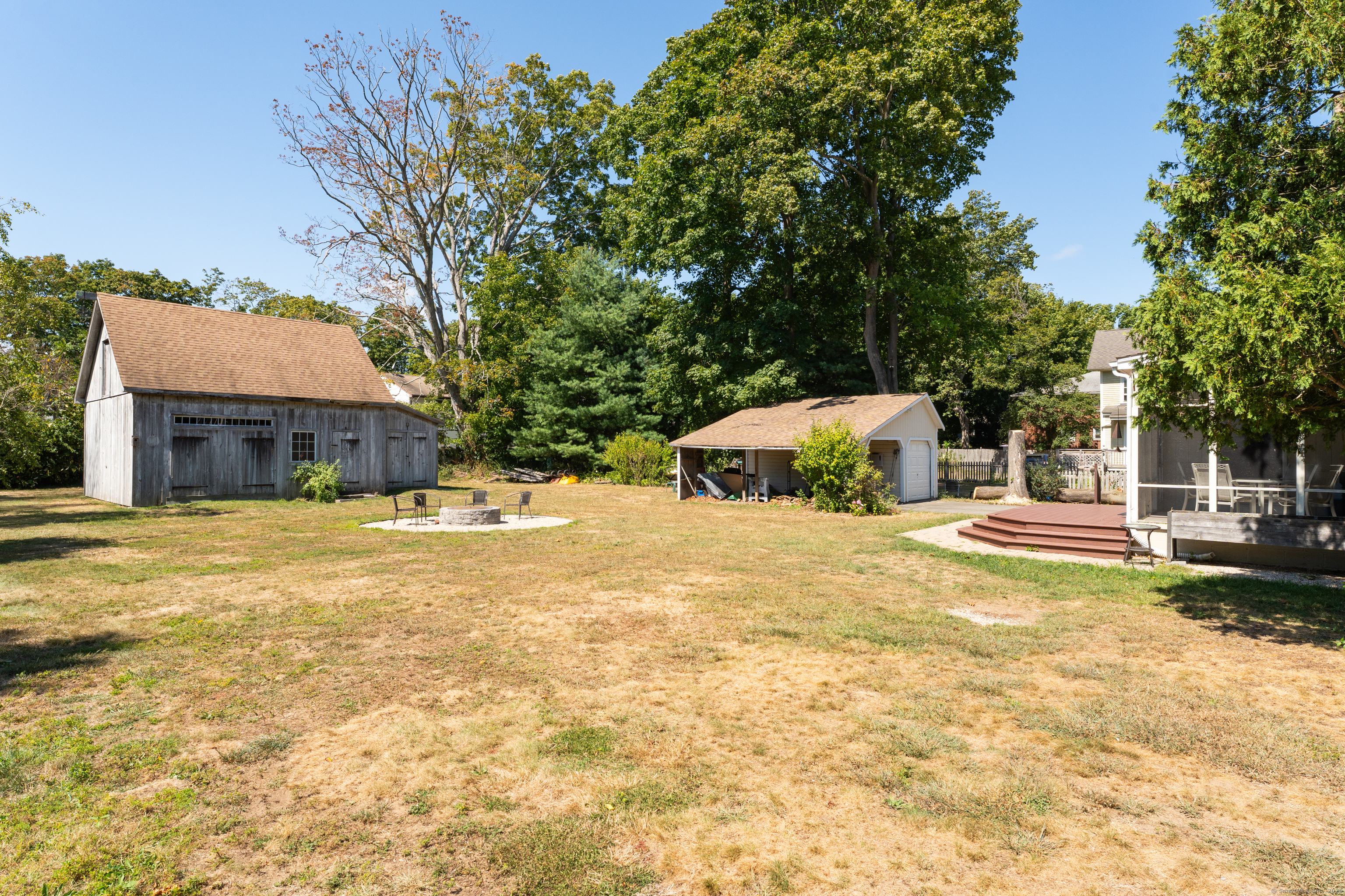 13 Waterside Lane Clinton, CT 06413 - Photo 12 of 40 a view of a house with a yard and large trees