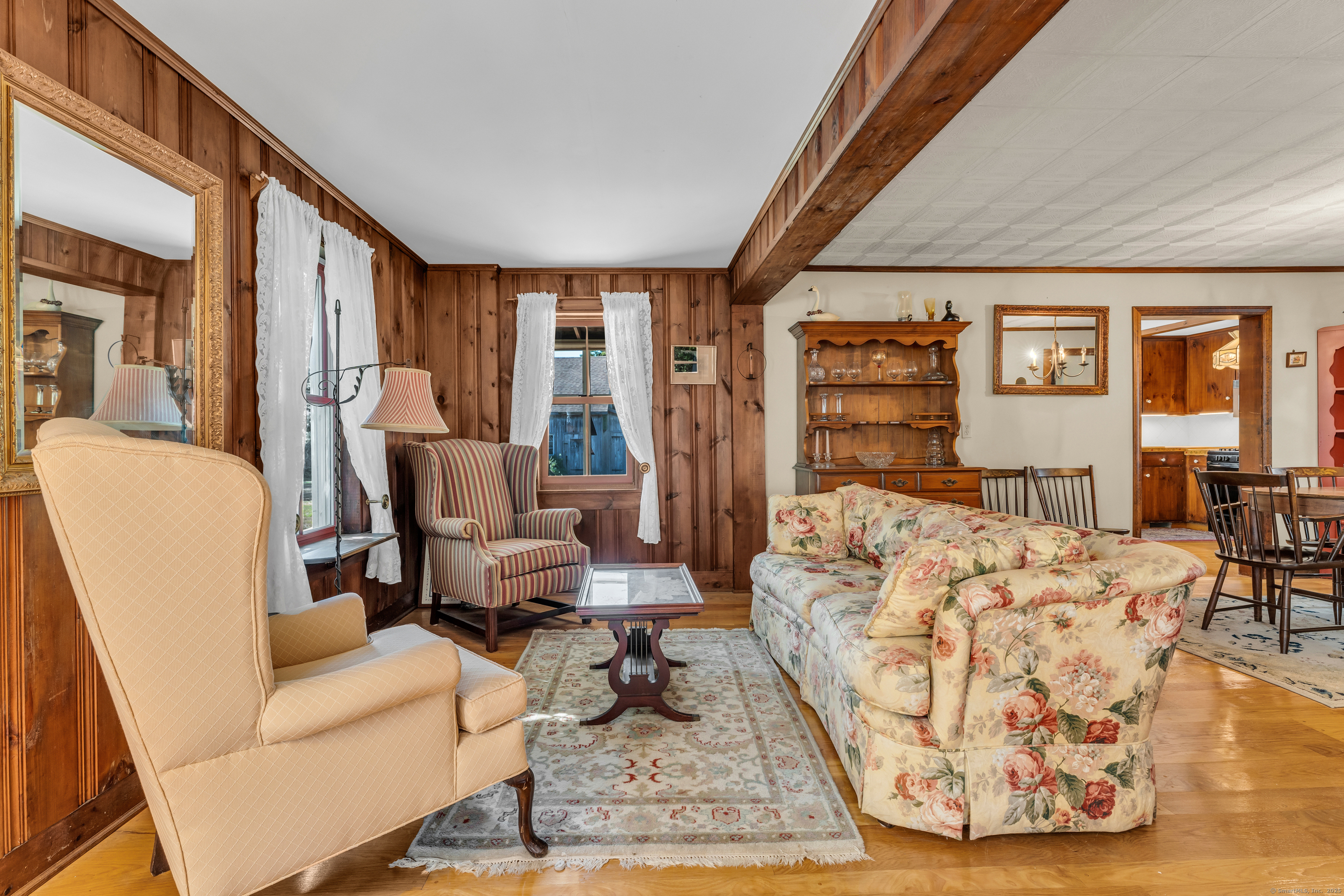 13 Waterside Lane Clinton, CT 06413 - Photo 15 of 40 a living room with furniture and large windows