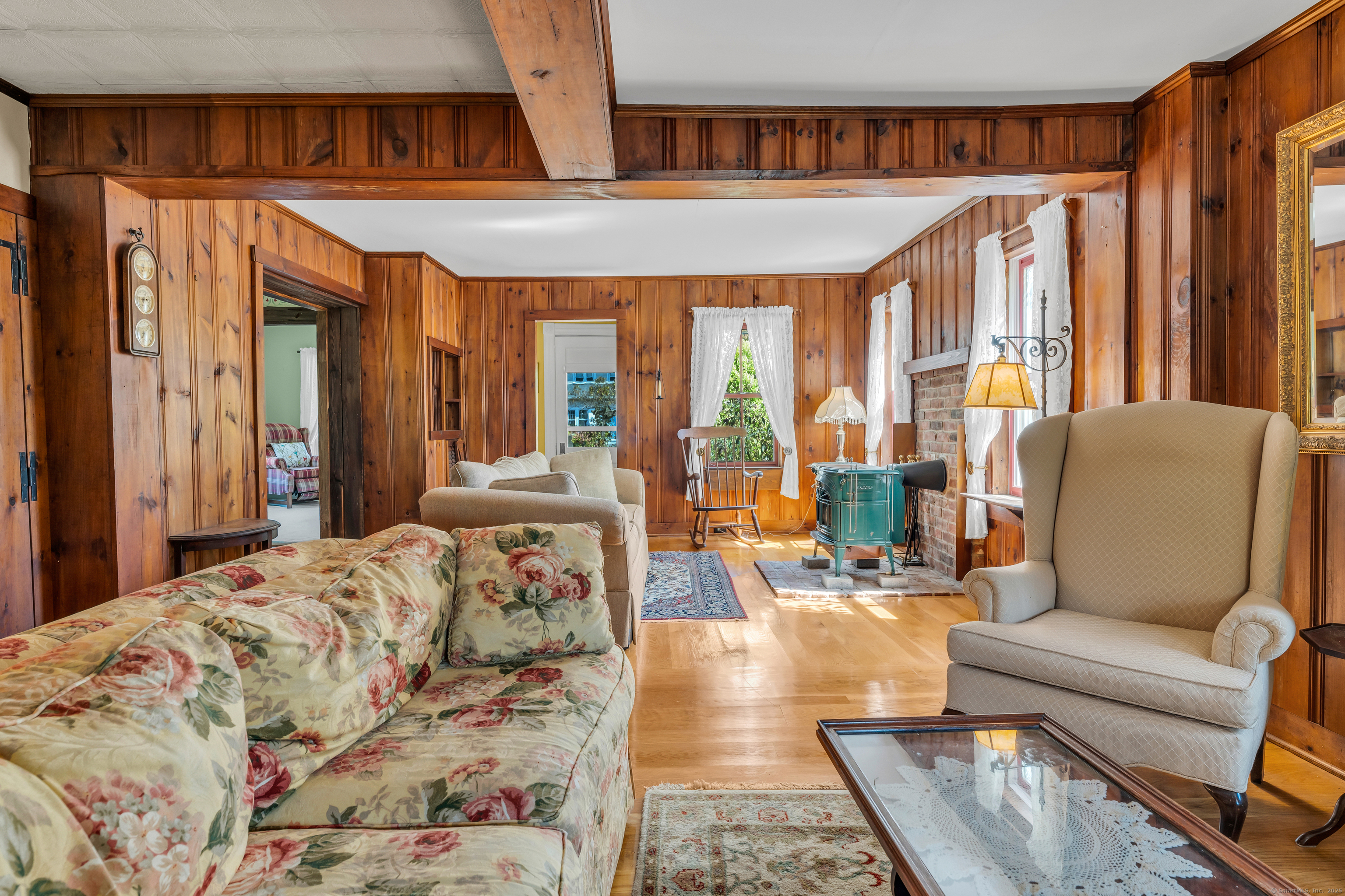 13 Waterside Lane Clinton, CT 06413 - Photo 16 of 40 a bedroom with furniture and large windows