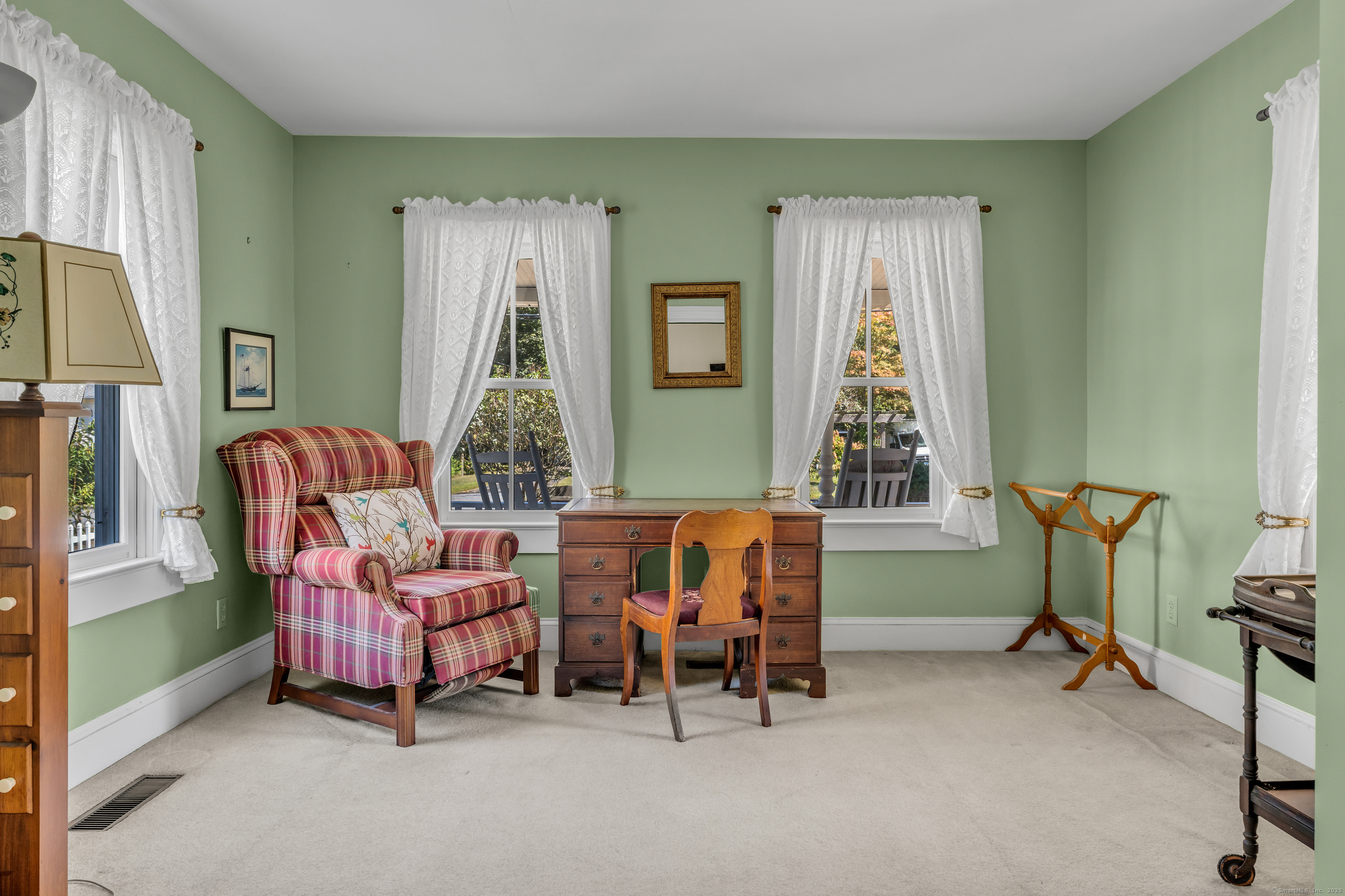 13 Waterside Lane Clinton, CT 06413 - Photo 19 of 40 a living room with furniture and a window