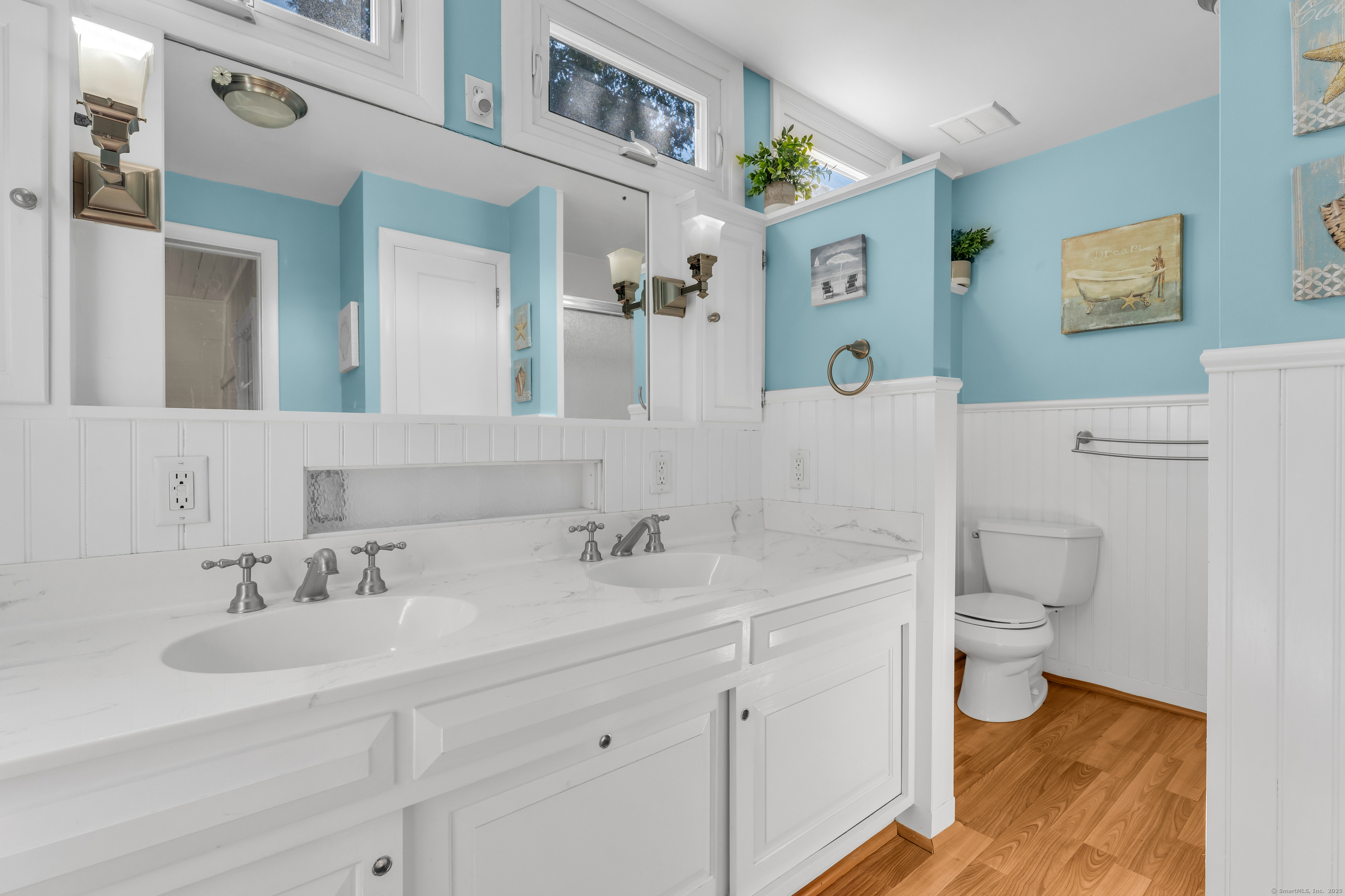 13 Waterside Lane Clinton, CT 06413 - Photo 33 of 40 a en suite bathroom with a toilet sink and mirror