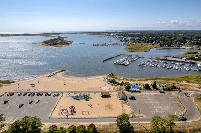 an aerial view of a house with a swimming pool