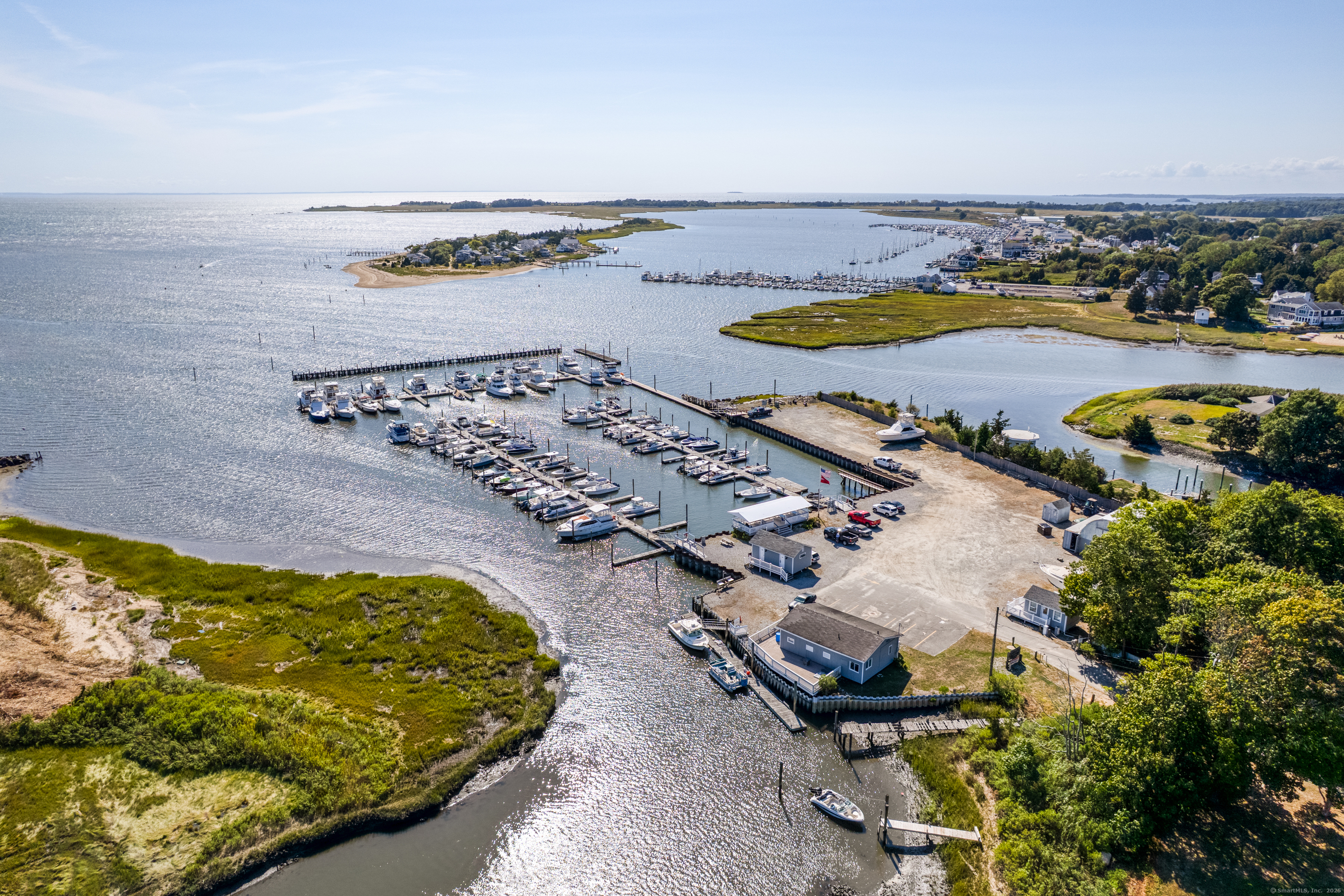 13 Waterside Lane Clinton, CT 06413 - Photo 8 of 40 an aerial view of a swimming pool and outdoor space