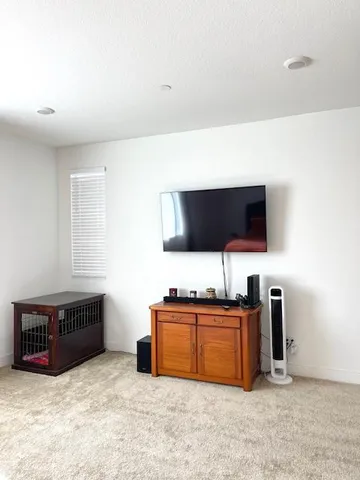 a view of workspace with flat screen tv