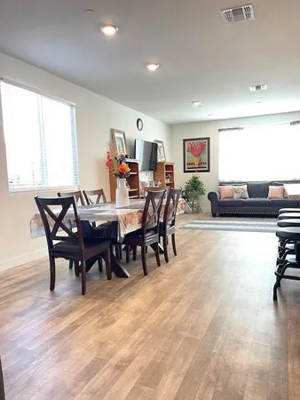 a view of a dining room with furniture