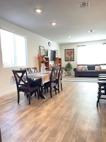 a view of a dining room with furniture