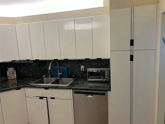 a room with gym equipment and a table