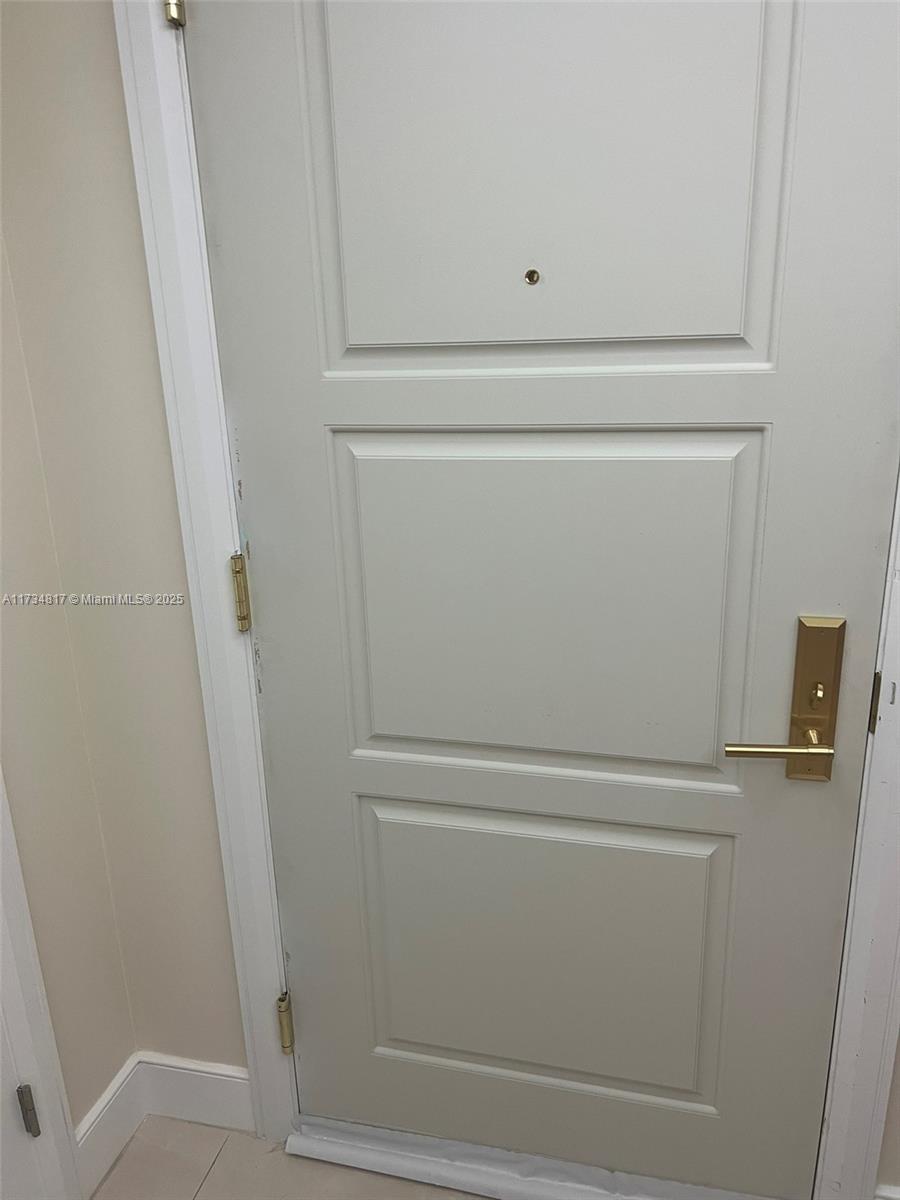 9801 Collins Avenue, Unit 17J Bal Harbour, FL 33154 - Photo 28 of 34 a close view of washer and dryer