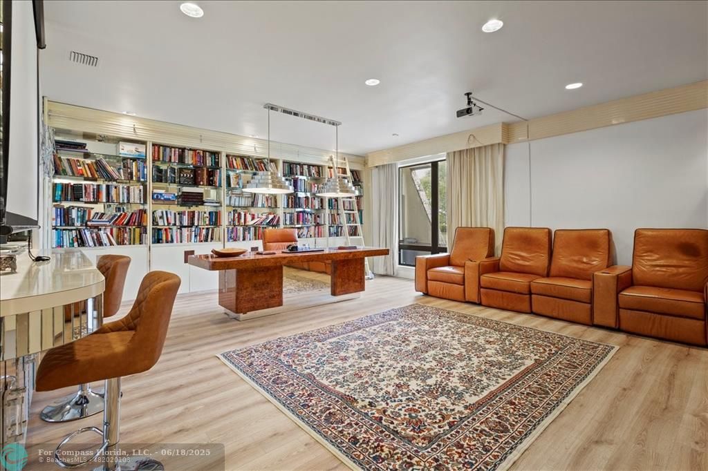 5304 Woodlands Boulevard Tamarac, FL 33319 - Photo 15 of 57 a living room with furniture and a rug