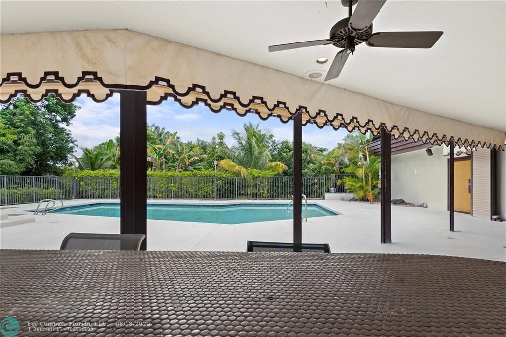 5304 Woodlands Boulevard Tamarac, FL 33319 - Photo 20 of 57 a view of a street with entryway