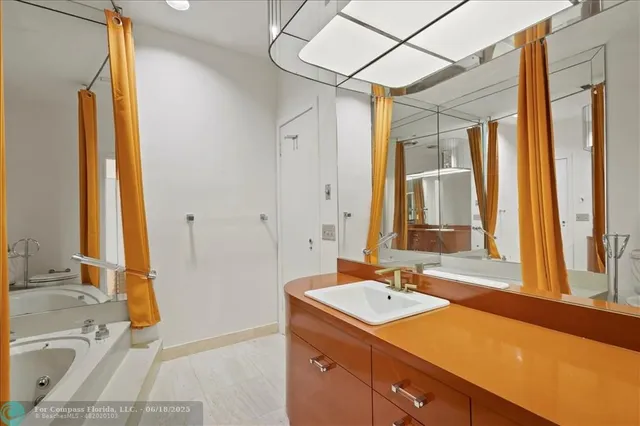 a bedroom with a bed and dresser