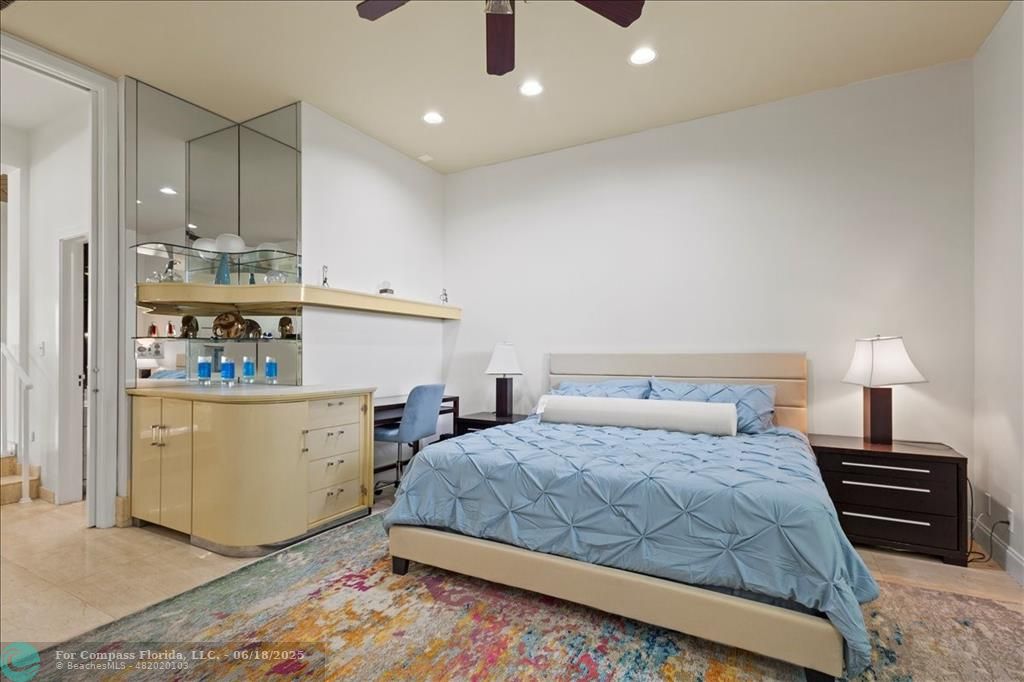 5304 Woodlands Boulevard Tamarac, FL 33319 - Photo 31 of 57 a bedroom with a bed and dresser