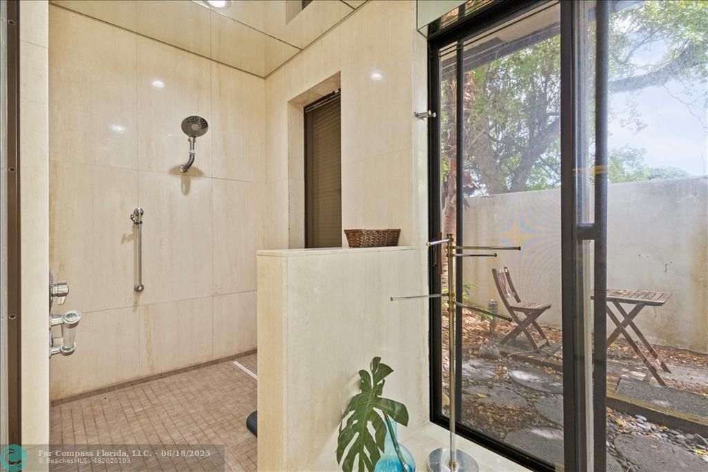 5304 Woodlands Boulevard Tamarac, FL 33319 - Photo 37 of 57 a bathroom with a shower