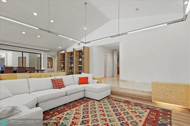 a living room with furniture and a table