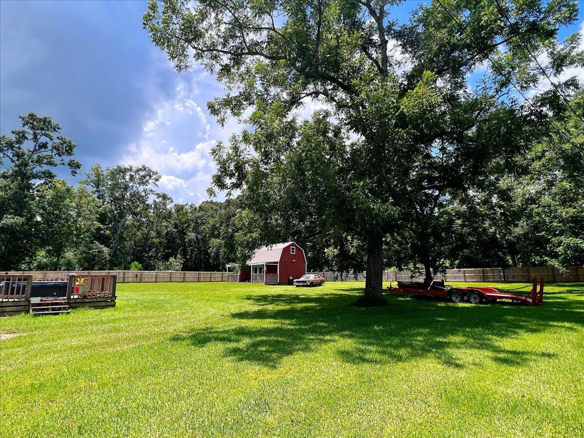 229 Madrid Road Cantonment, FL 32533 - Photo 80 of 84 a view of a swimming pool with a bench