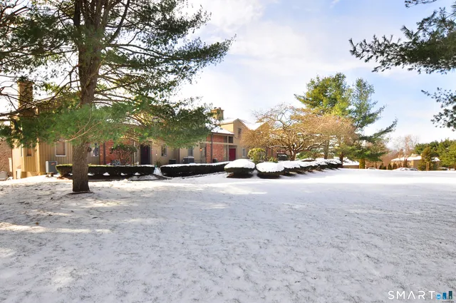 a view of street with parked cars