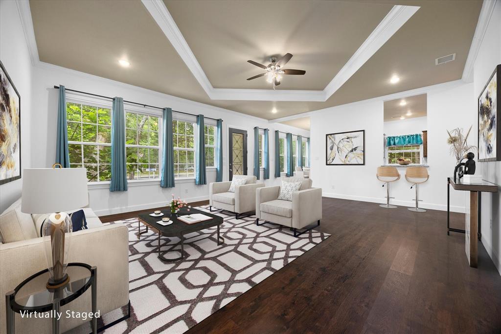 2526 Fox Point Circle Quinlan, TX 75474 - Photo 11 of 35 Banks of windows provide ample natural lighting!