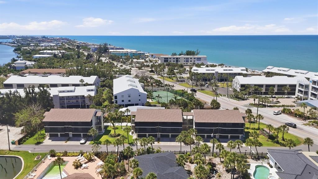2729 North Beach Road, Unit 211 Englewood, FL 34223 - Photo 5 of 51 an aerial view of multiple houses