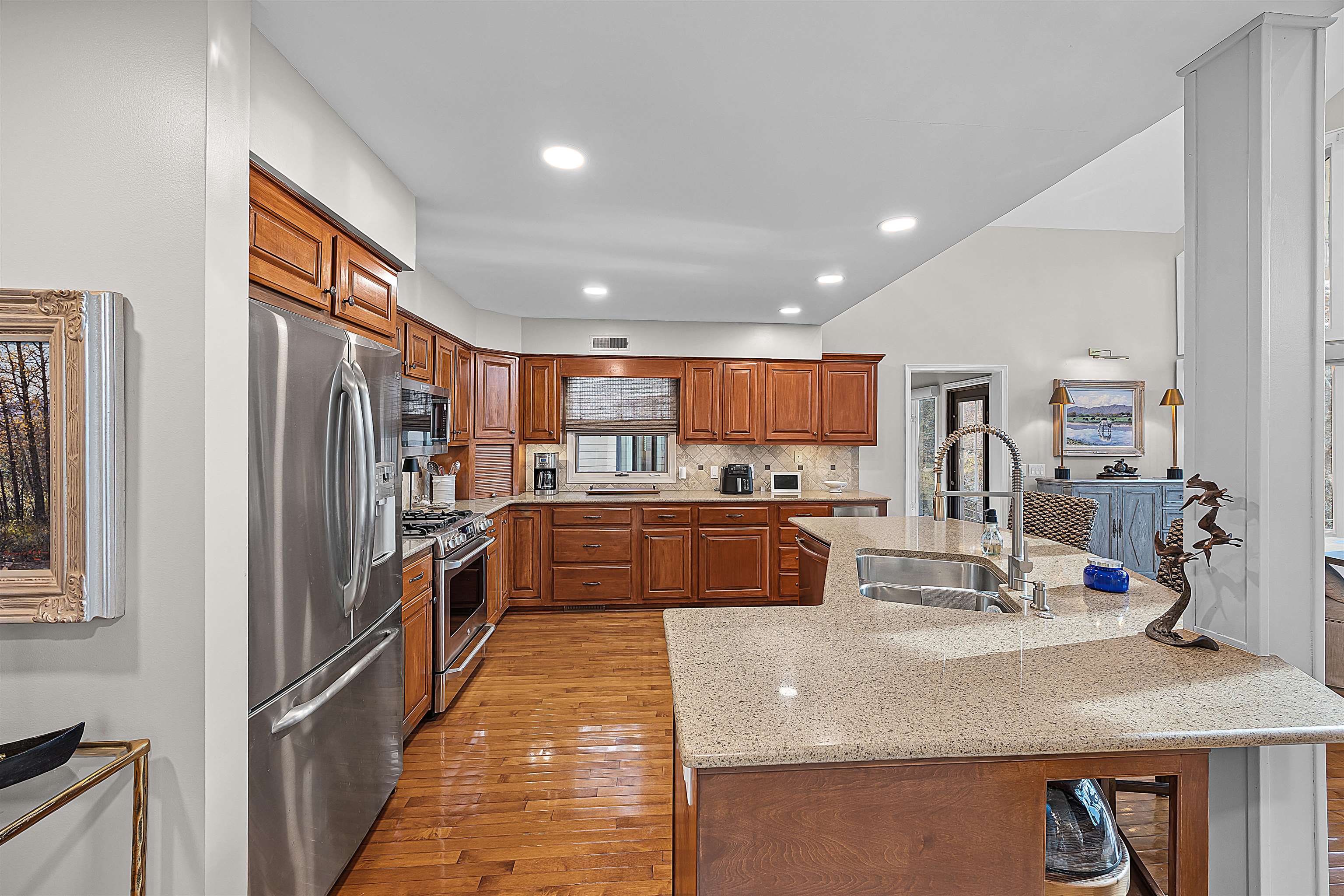 195 Ridge View Savannah, TN 38372 - Photo 15 of 40 a kitchen with stainless steel appliances granite countertop a refrigerator and a sink