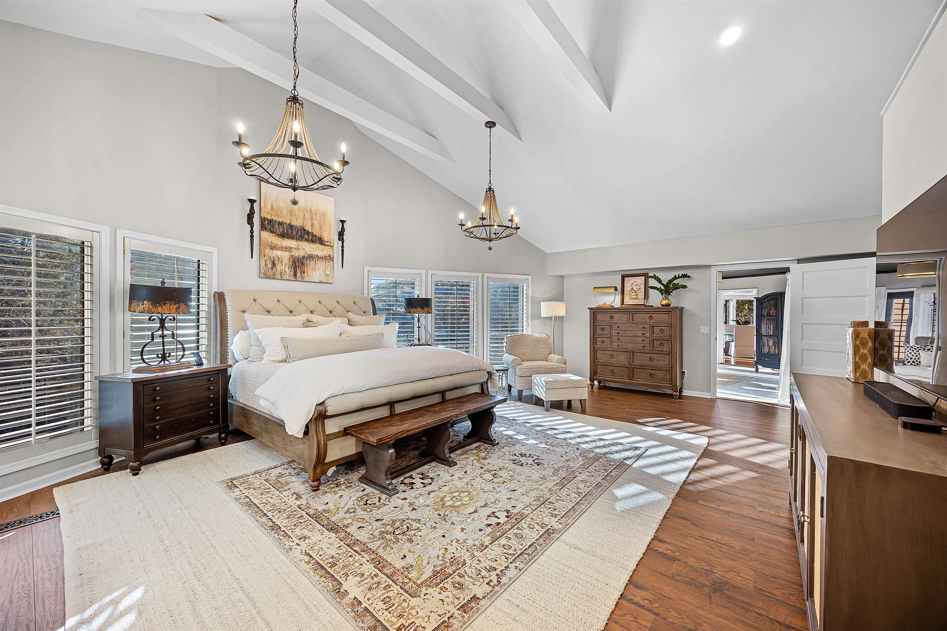 195 Ridge View Savannah, TN 38372 - Photo 18 of 40 a spacious bedroom with a bed dresser and a flat screen tv