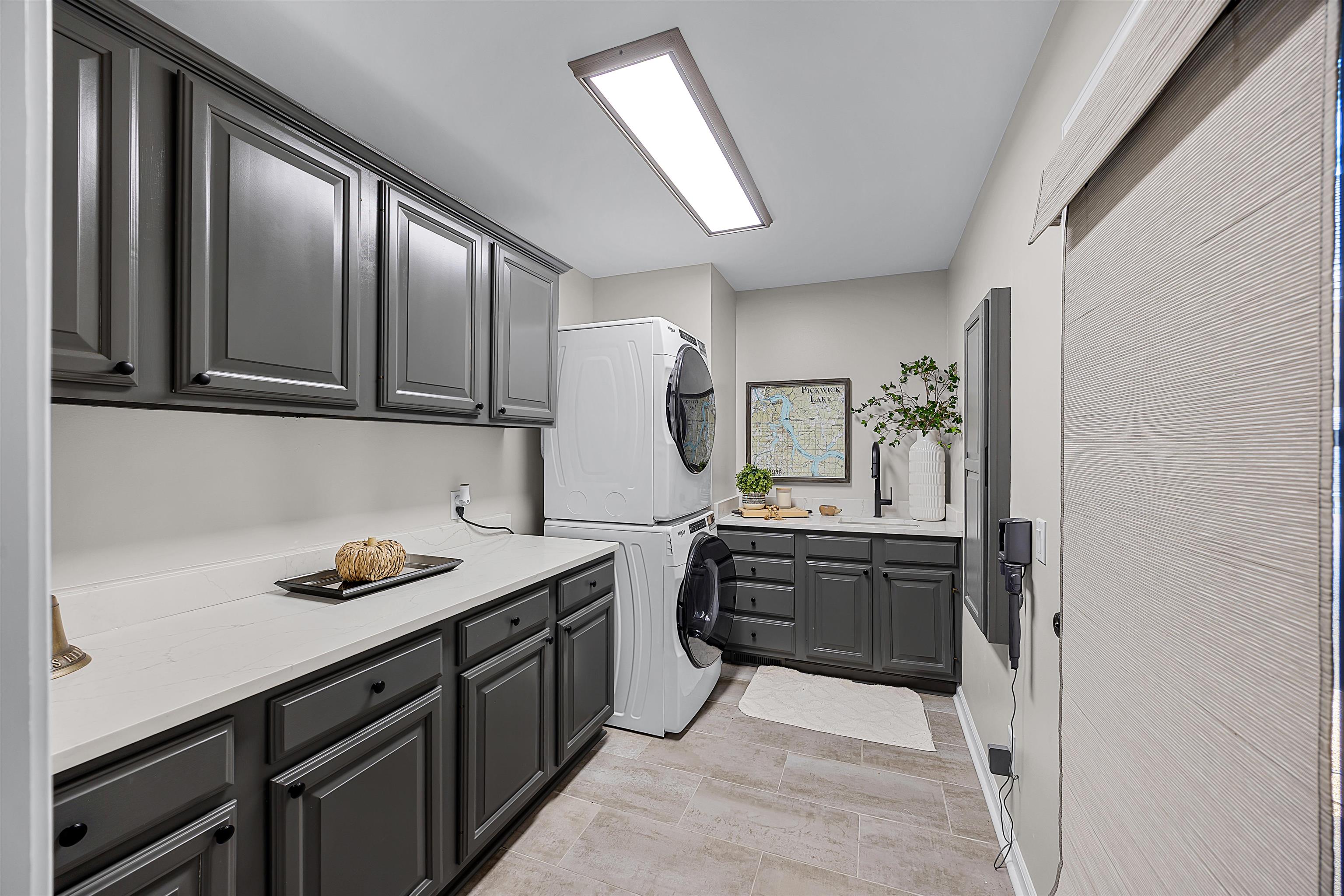 195 Ridge View Savannah, TN 38372 - Photo 21 of 40 a kitchen with stainless steel appliances granite countertop a sink stove and cabinets