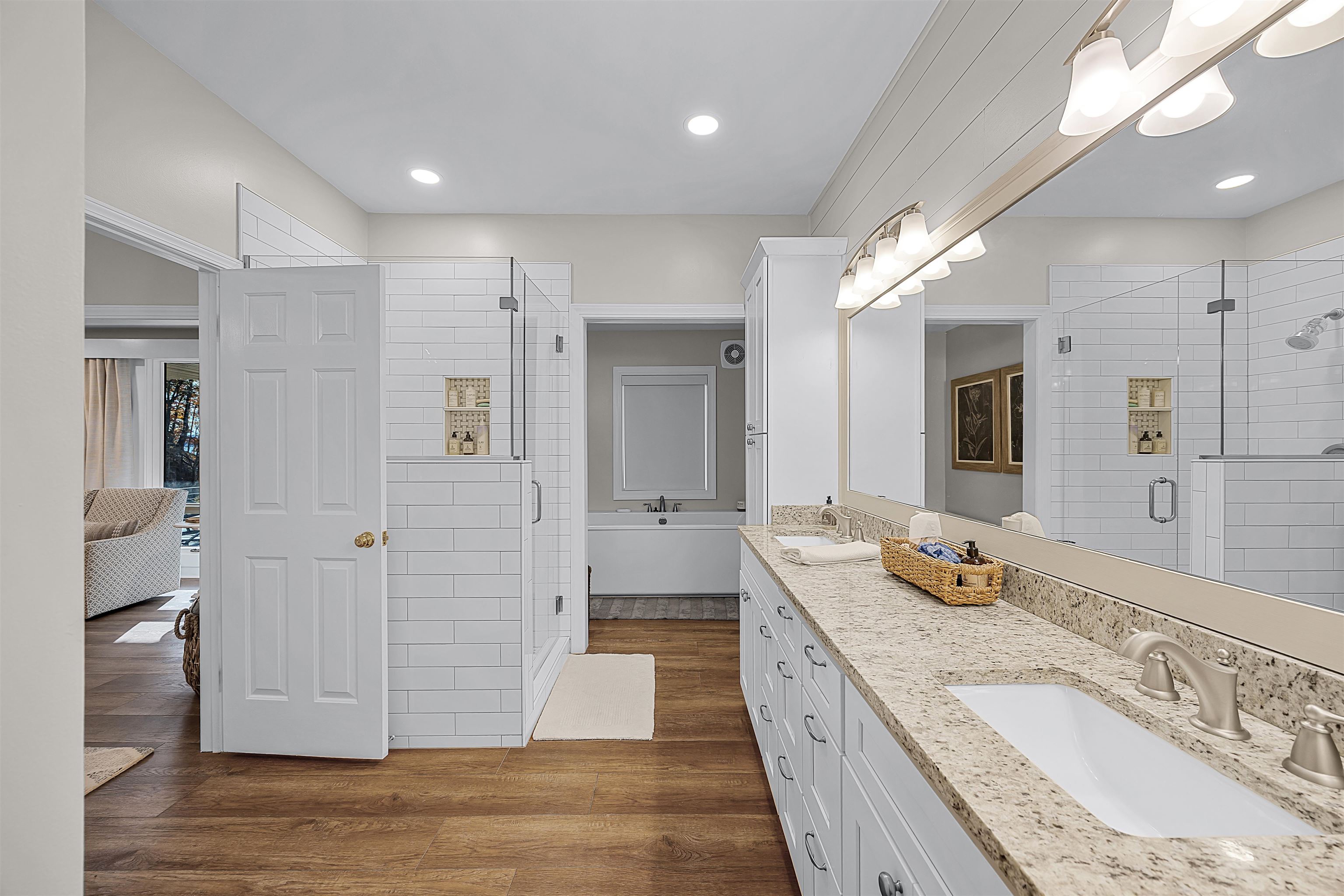 195 Ridge View Savannah, TN 38372 - Photo 23 of 40 a spacious bathroom with a granite countertop sink mirror and shower