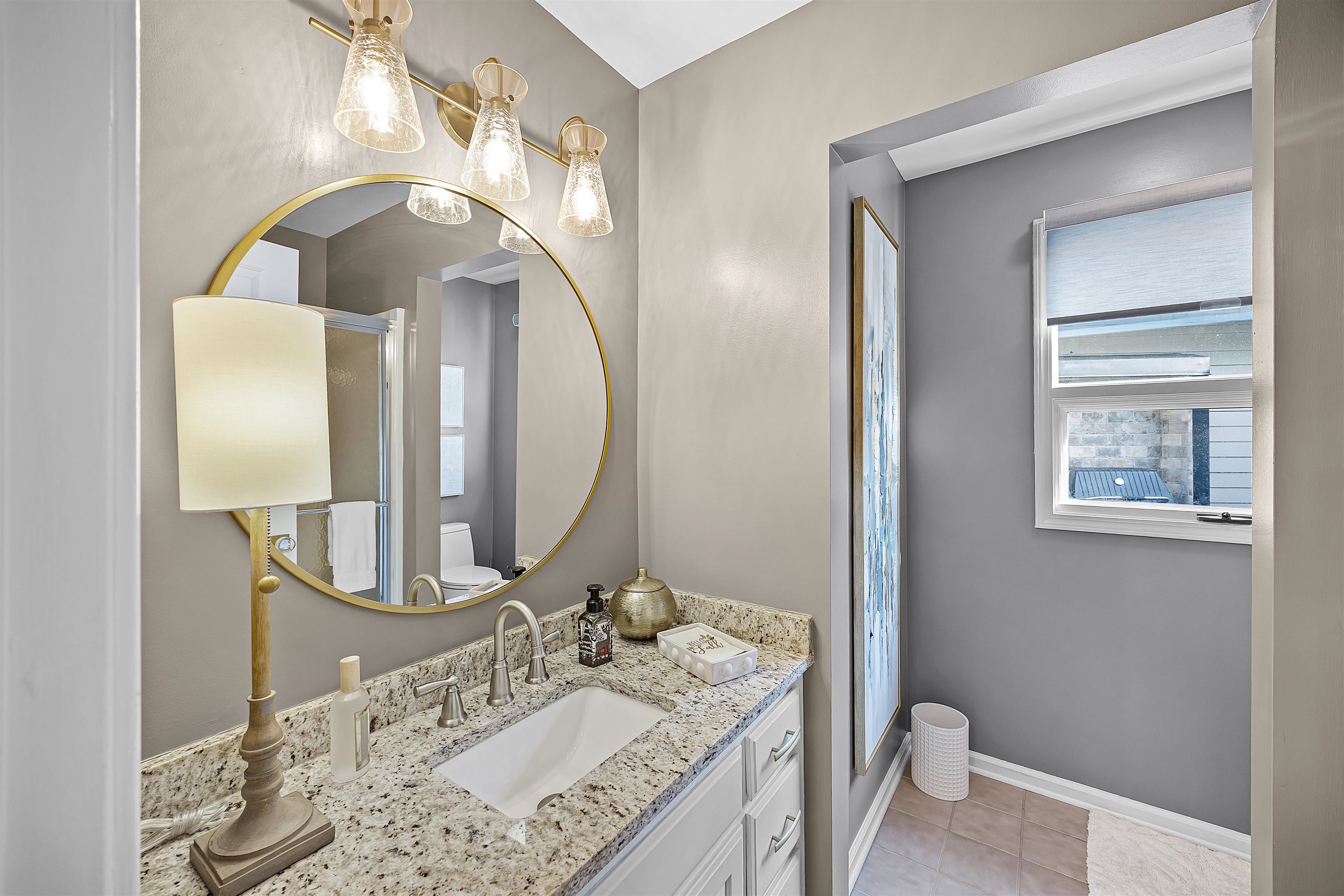 195 Ridge View Savannah, TN 38372 - Photo 25 of 40 a bathroom with a sink vanity and a mirror