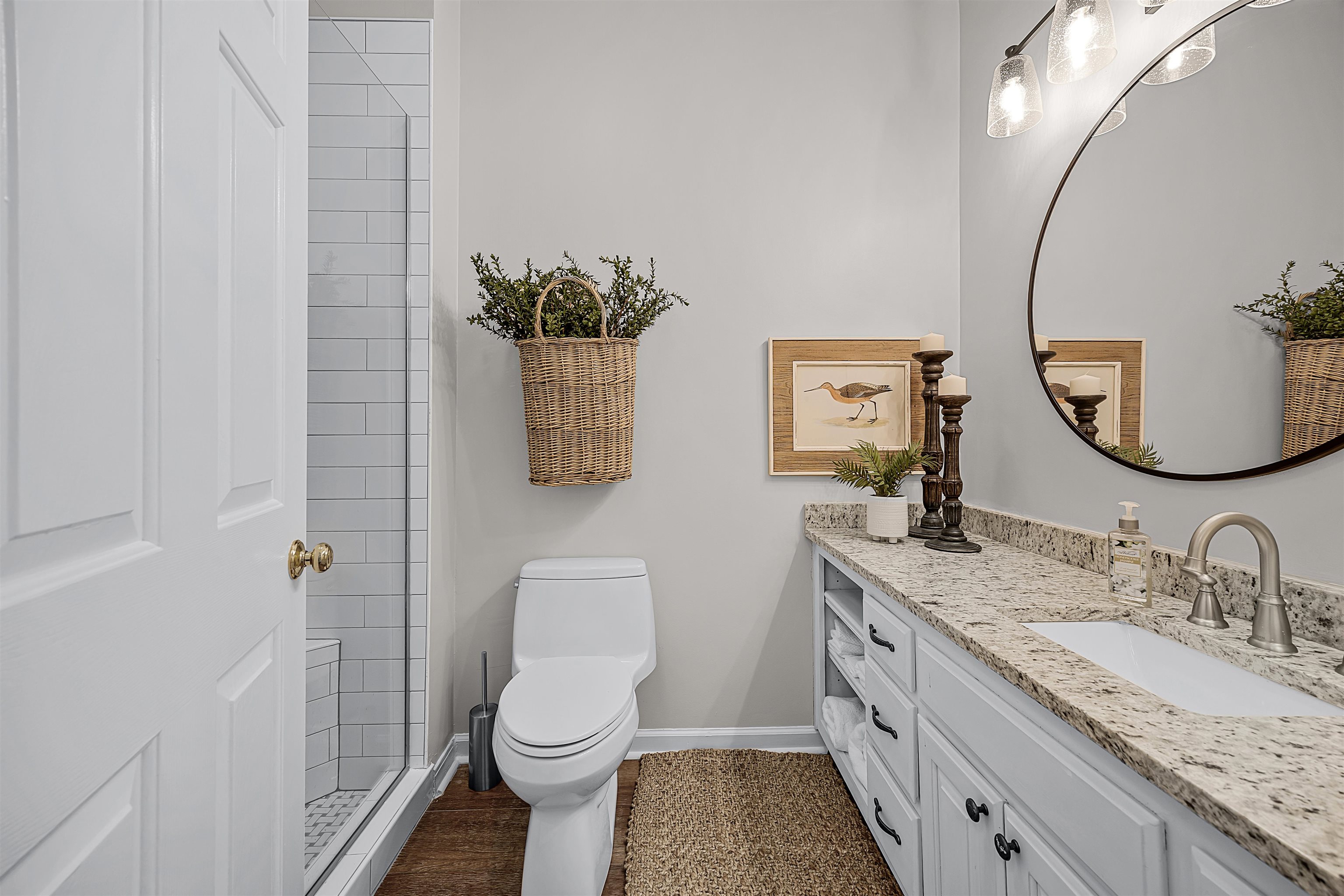 195 Ridge View Savannah, TN 38372 - Photo 28 of 40 a bathroom with a granite countertop toilet sink and mirror