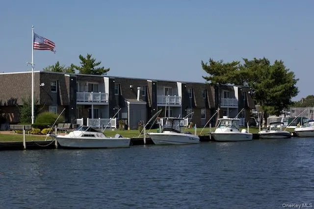 a view of a patio with swimming pool table and chairs