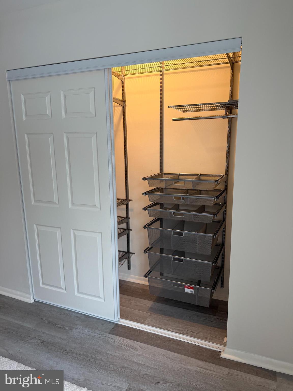 3110 Adderley Court, Unit 245A Silver Spring, MD 20906 - Photo 13 of 31 a view of walk in closet with empty racks